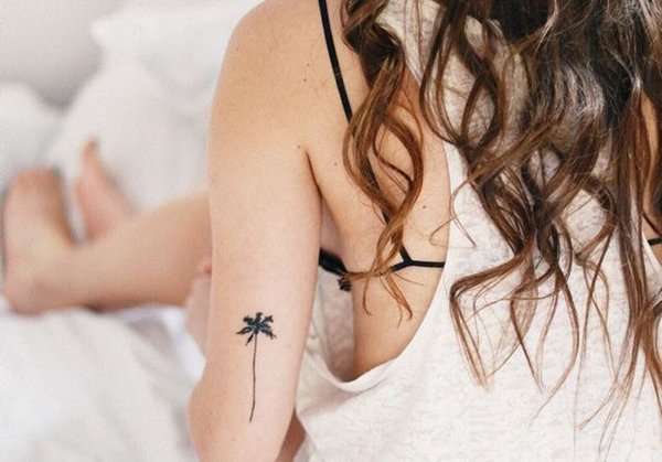 Comment être une femme chic et classe avec un tatouage ?